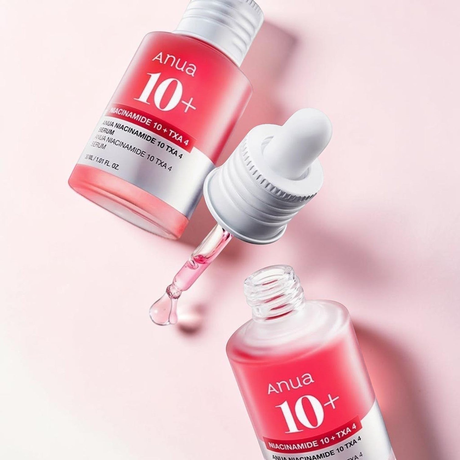 Anua Niacinamide 10% + TXA 4% Serum in a pink glass bottle with a dropper. Lightweight serum for brightening and even skin tone.